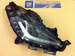 We have brand new C7 headlights for $850 each
